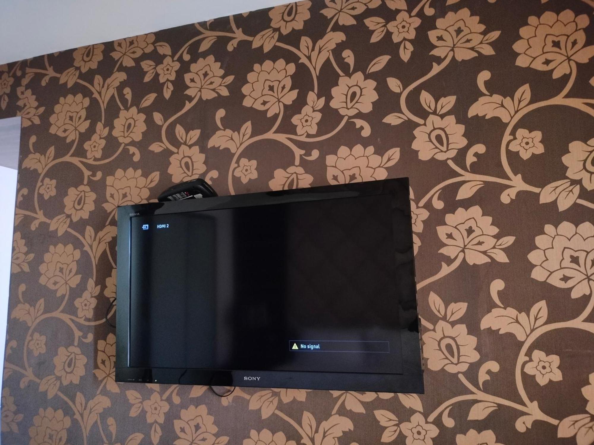 Holiday Inn Chandigarh Panchkula, An Ihg Hotel Dış mekan fotoğraf A television mounted on a wall